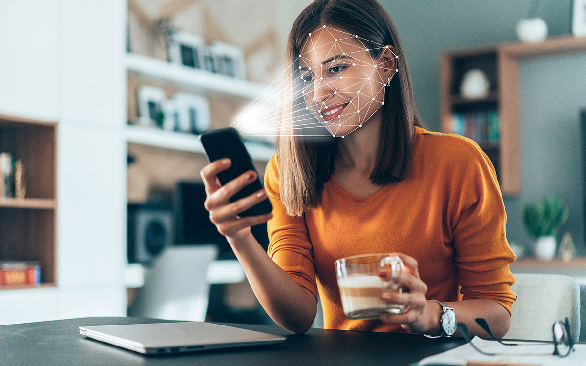 woman completing a biometric face scan