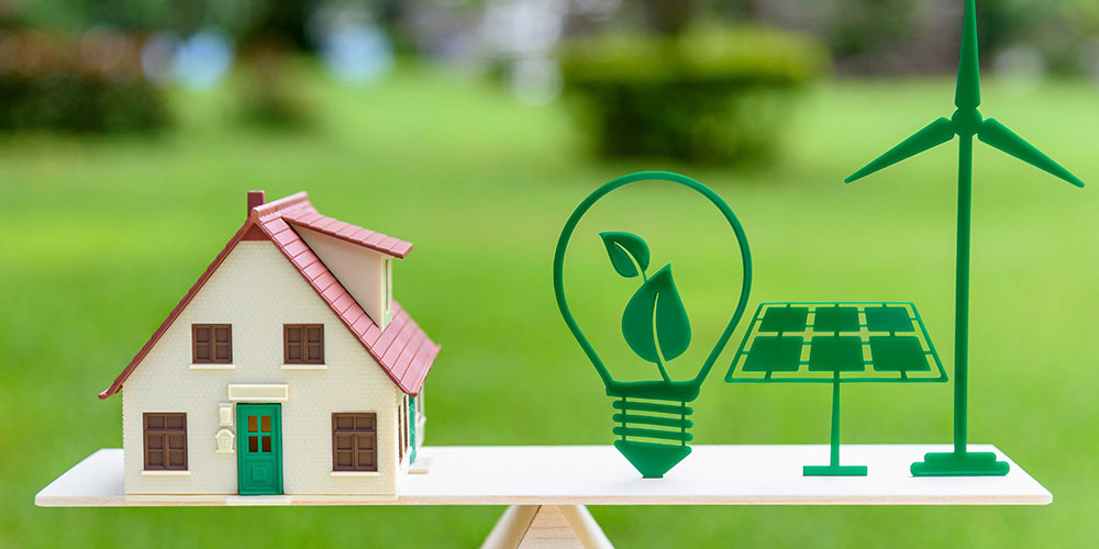 A mobile of a house with climate and energy symbols