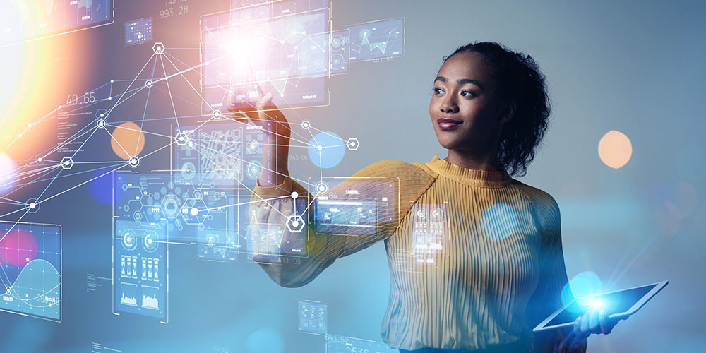 young woman holding iPad and touching virtual projected technology imagery